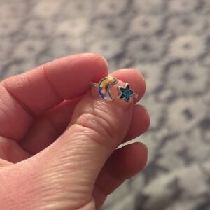 Silver Ring with Moon and Star Design